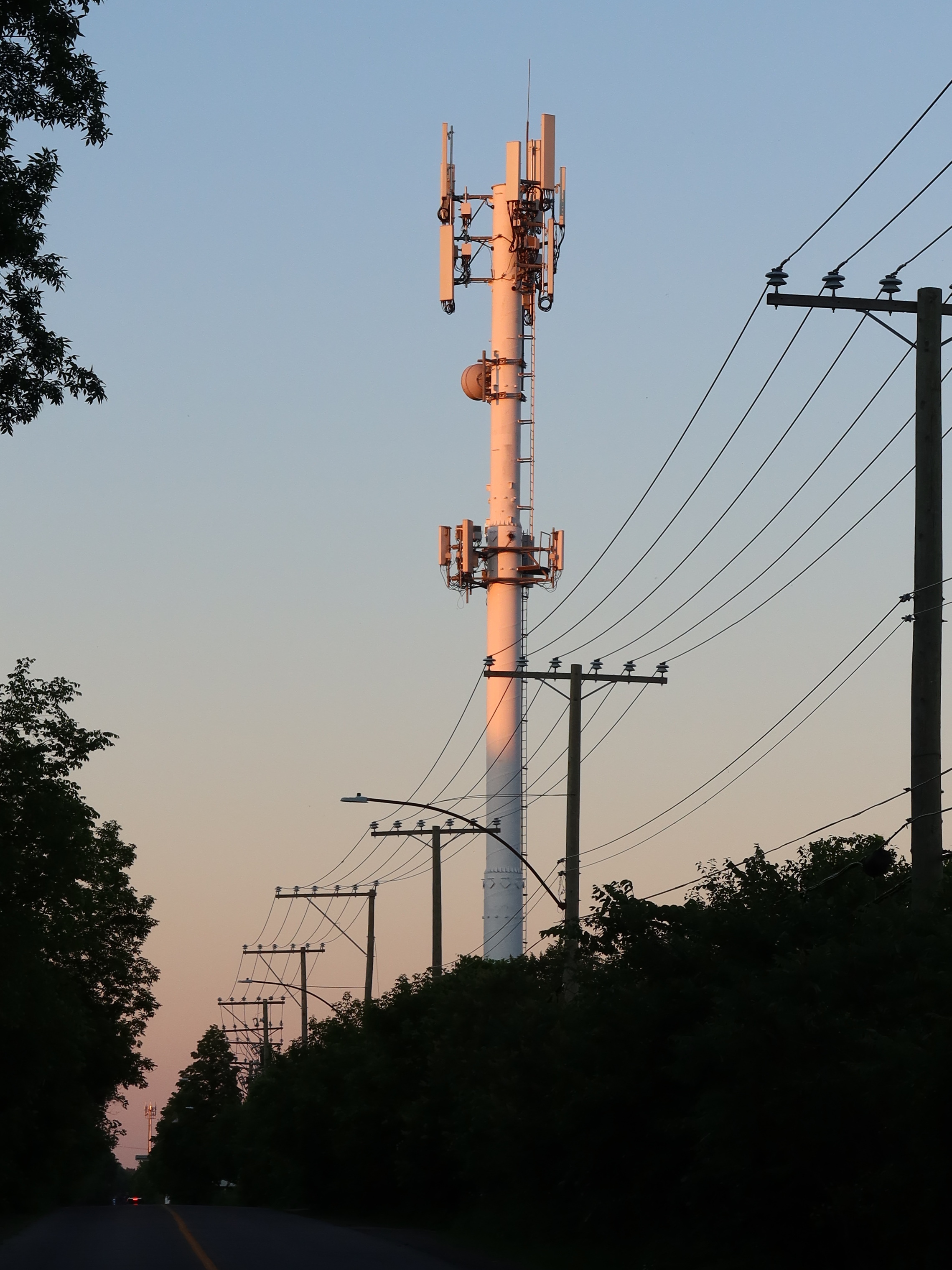 2021-06-19_2028-596-power-lines-cell-tower_th.jpg