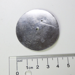 the front of the metal dial